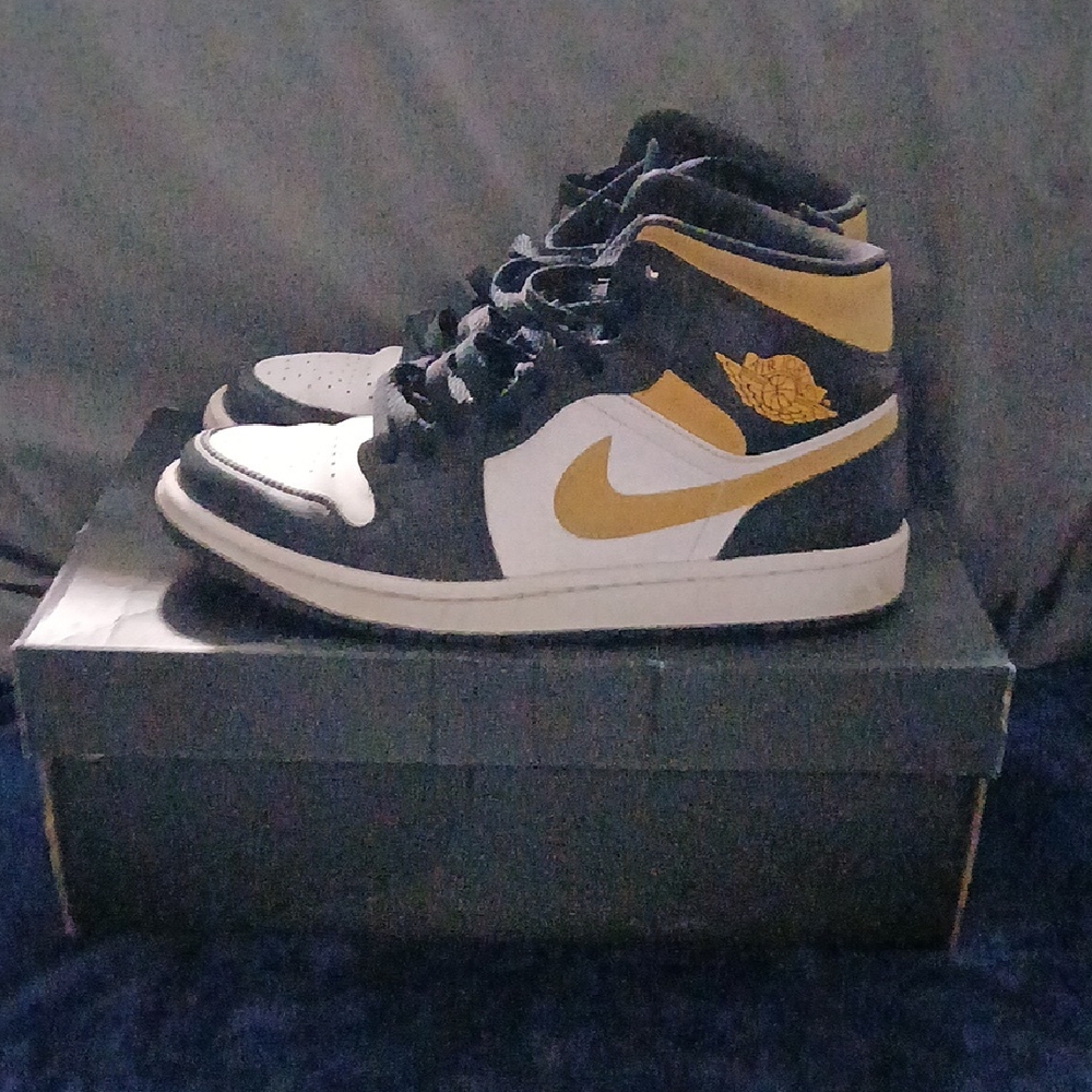 Jordan Black and Gold Sneakers